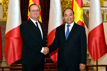Primer ministro vietnamita recibe al presidente francés