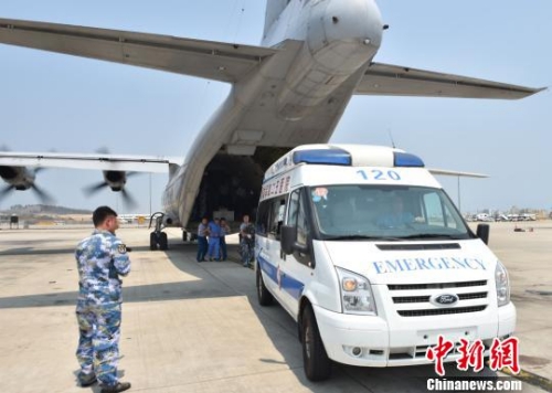 china schickt offensichtlich transportflugzeug zum chu thap-riff hinh 0